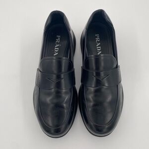 Prada Spazzolato Rois Leather Penny Loafers In Black